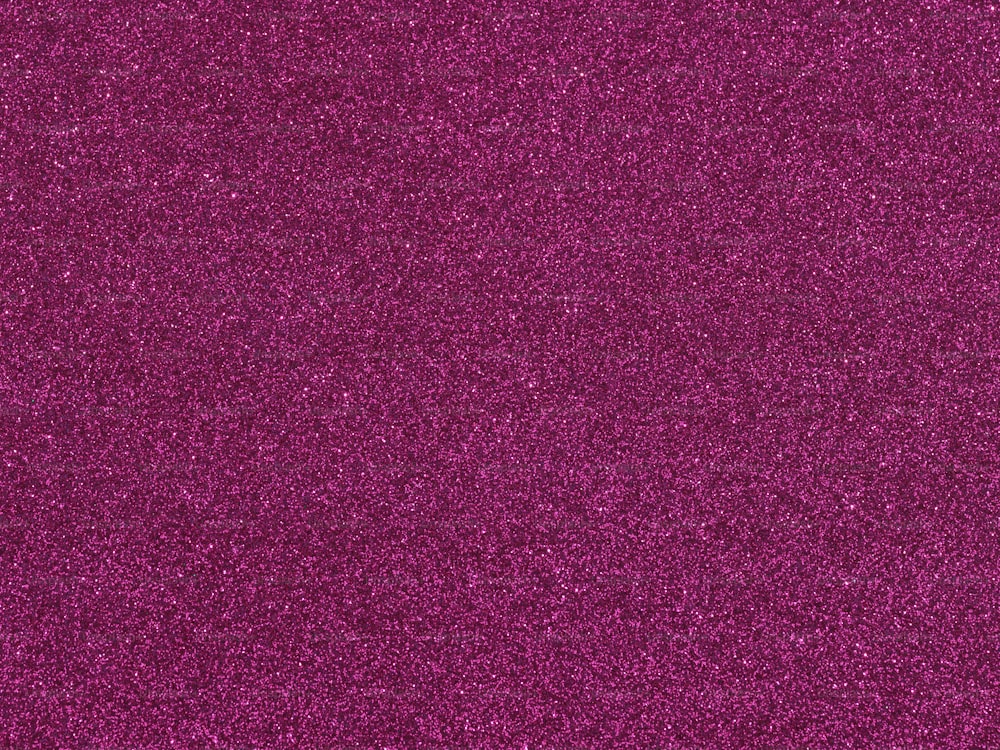 Gros plan d’un fond de paillettes violettes