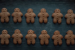 a bunch of cookies that are shaped like people