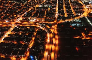 an aerial view of a city at night