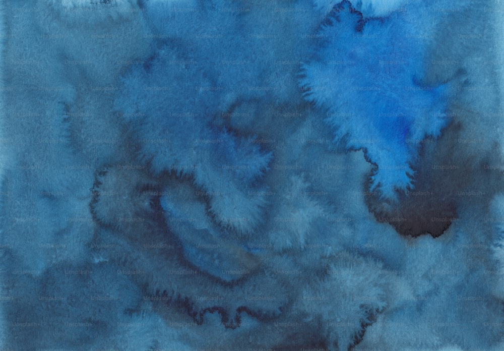 a watercolor painting of blue and grey colors