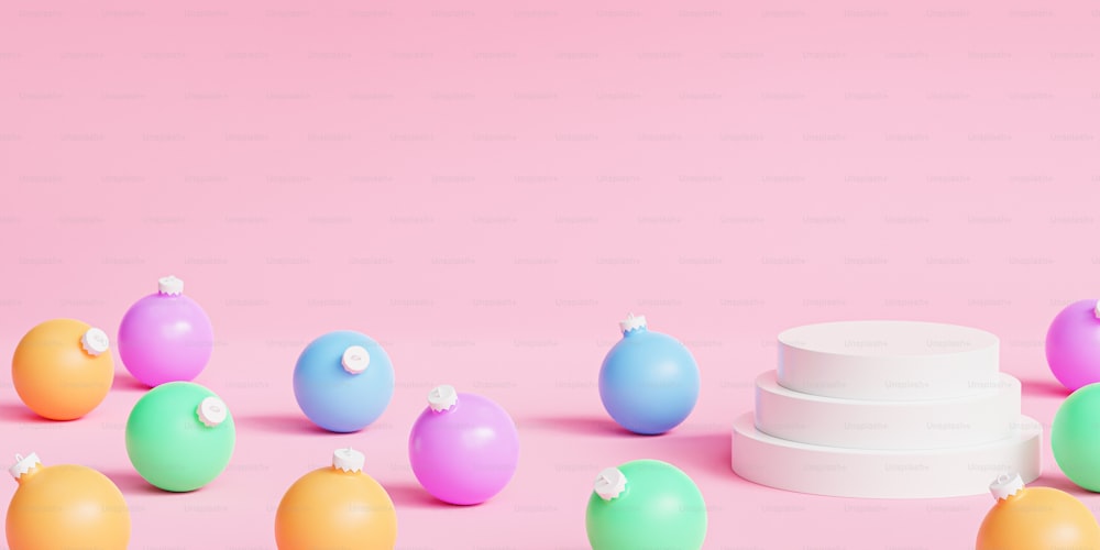 a group of plastic eggs sitting next to a cake