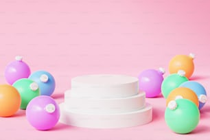 a white cake stand surrounded by balloons on a pink background