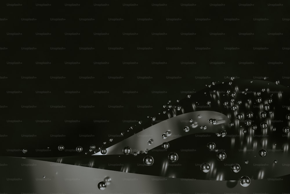 Ein Schwarz-Weiß-Foto von Wassertropfen