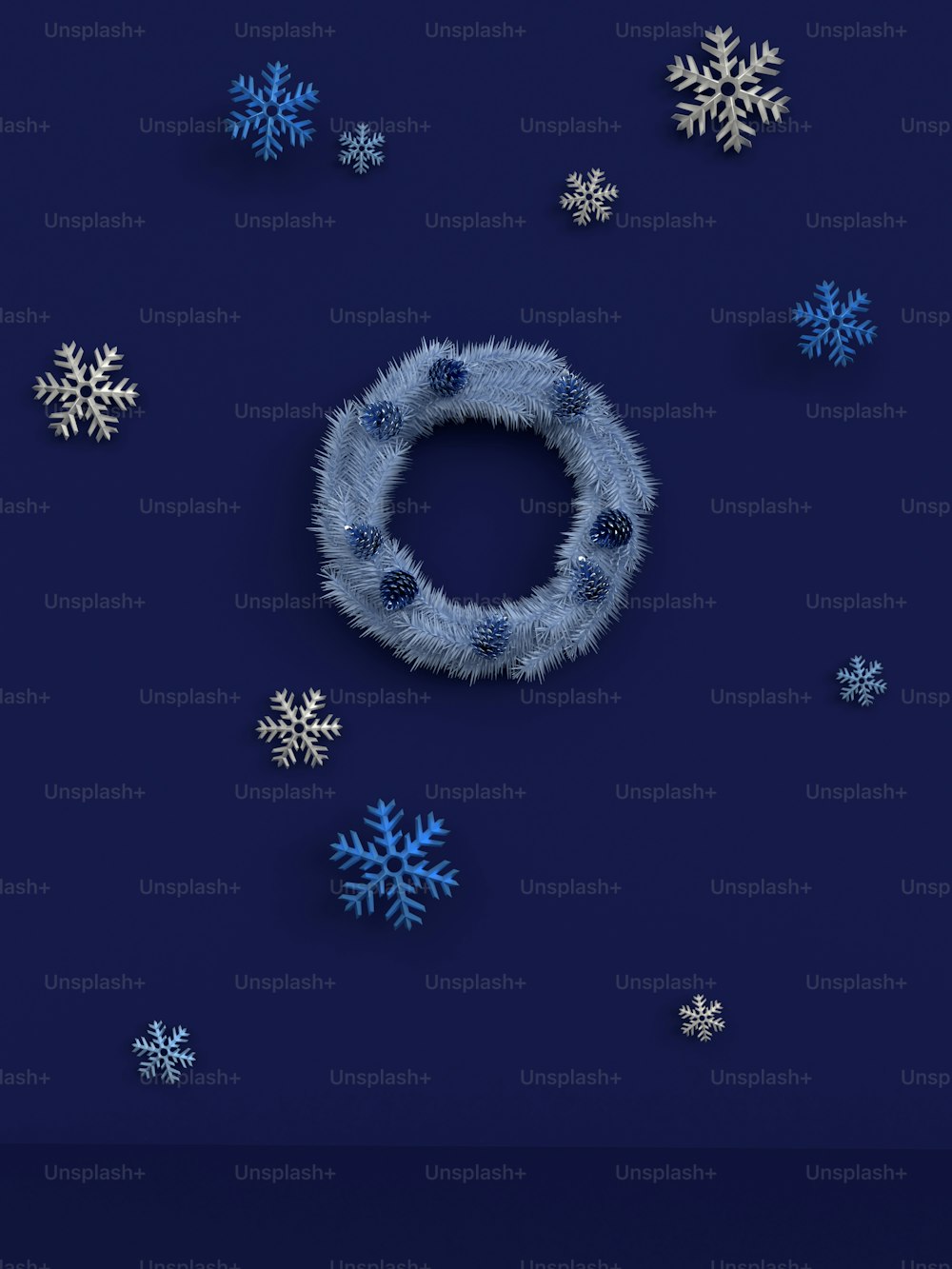 Des flocons de neige et une couronne sur fond bleu