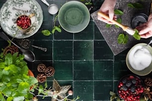 a table topped with plates and bowls filled with food