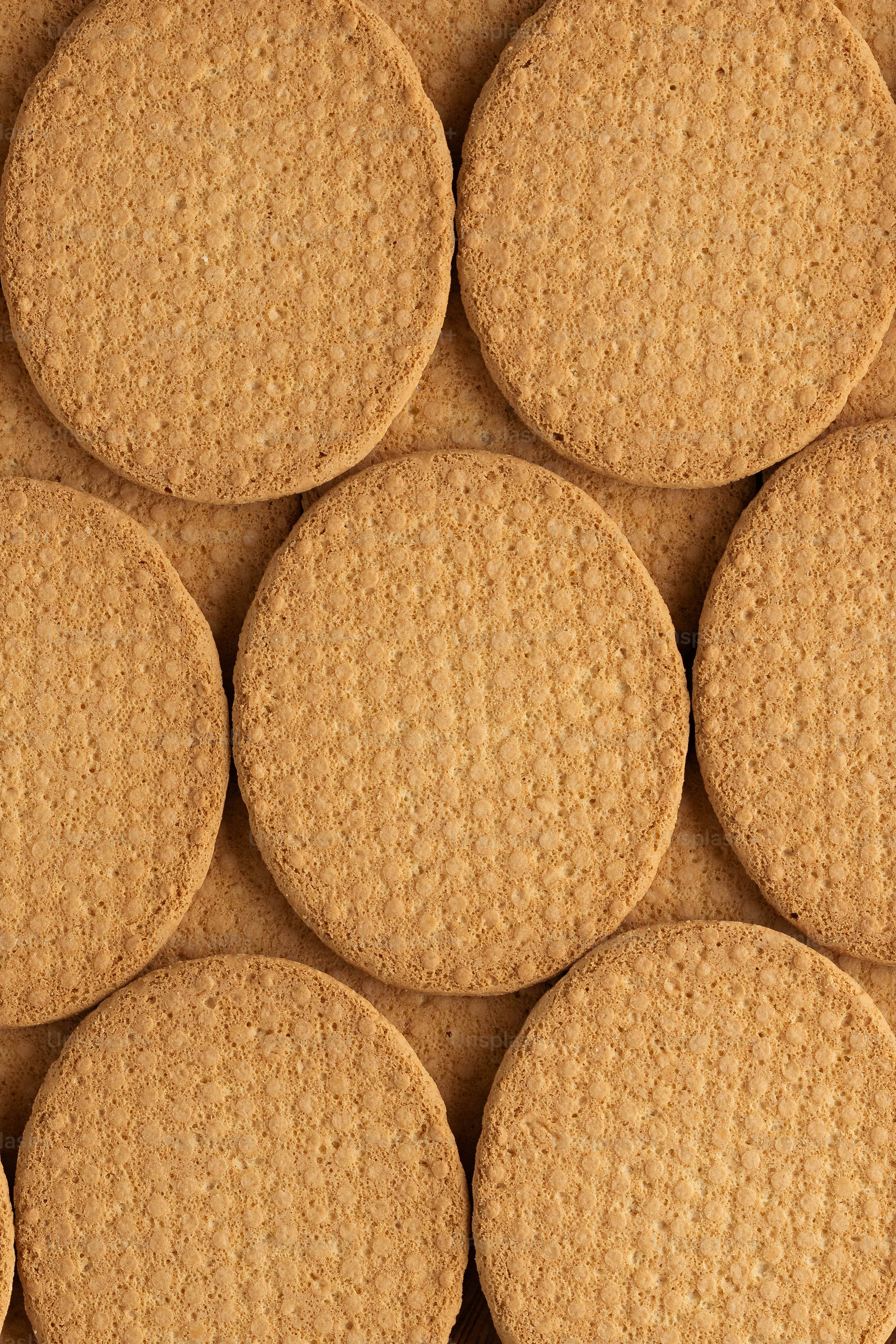 a pile of round cookies sitting on top of each other