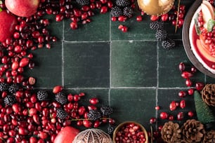 a table topped with lots of different types of fruit