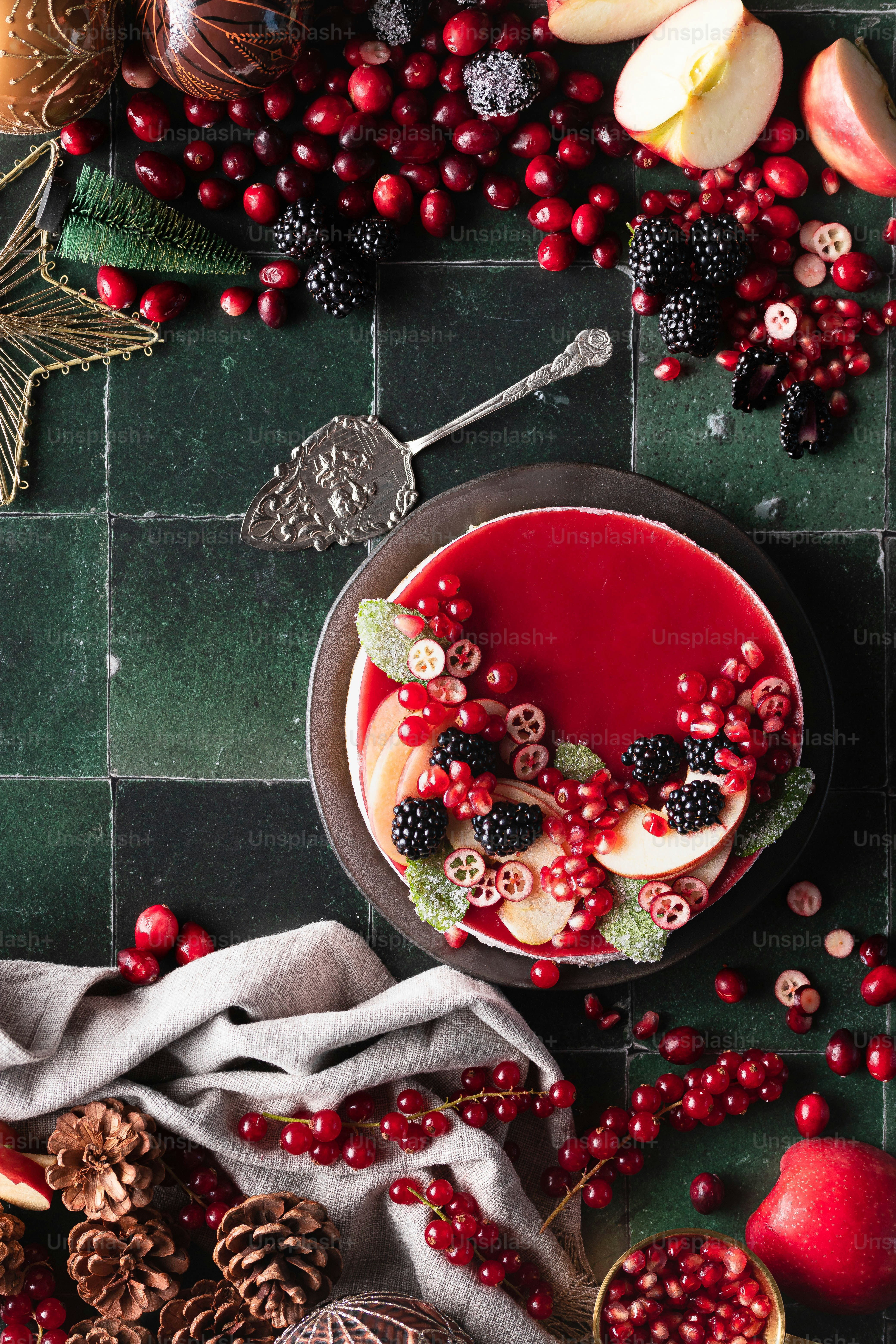 a bowl of fruit and berries on a table
