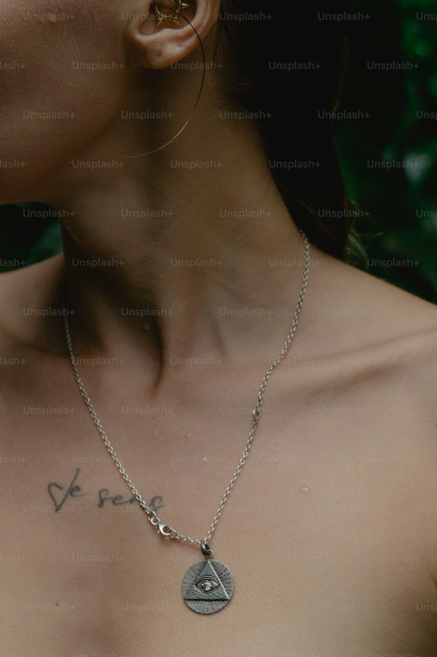 a woman with a tattoo on her chest