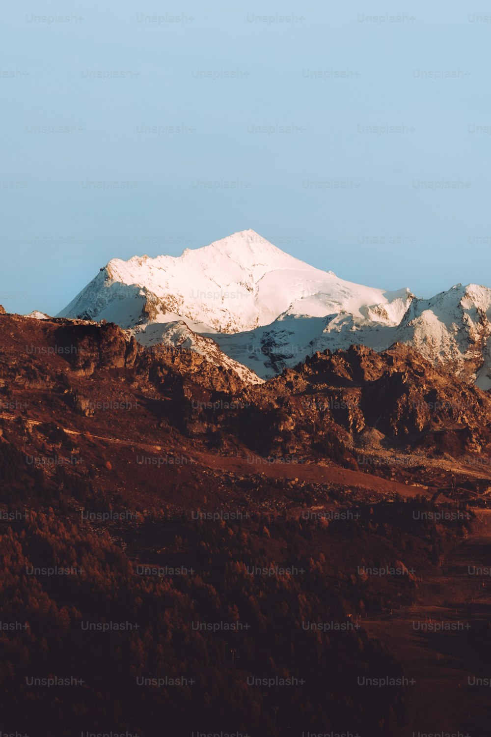 a mountain with snow on top of it