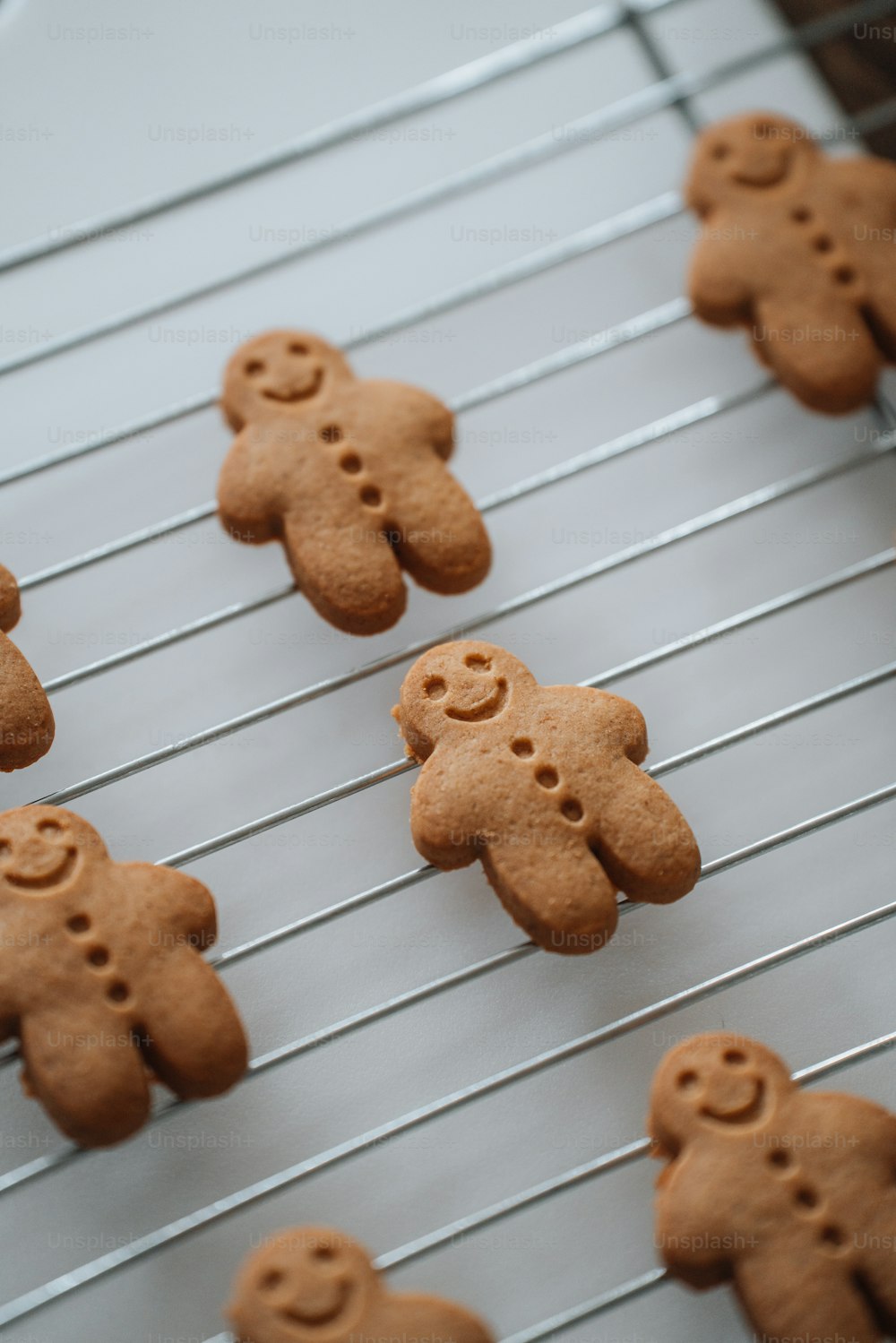 a bunch of cookies that are on a rack