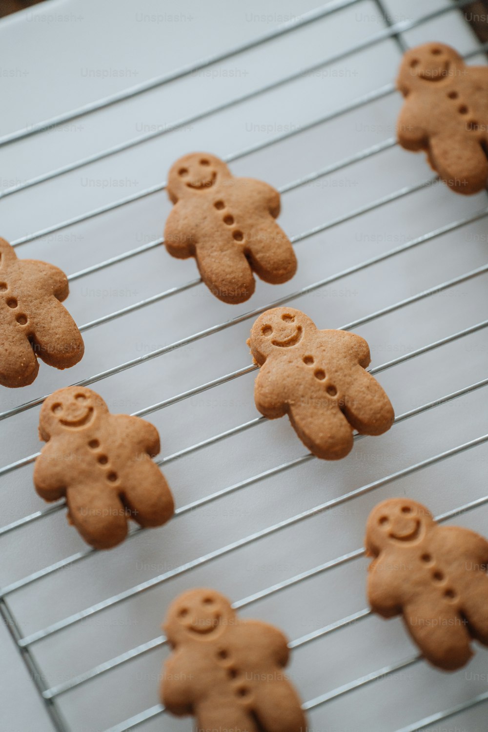 a bunch of cookies that are on a rack