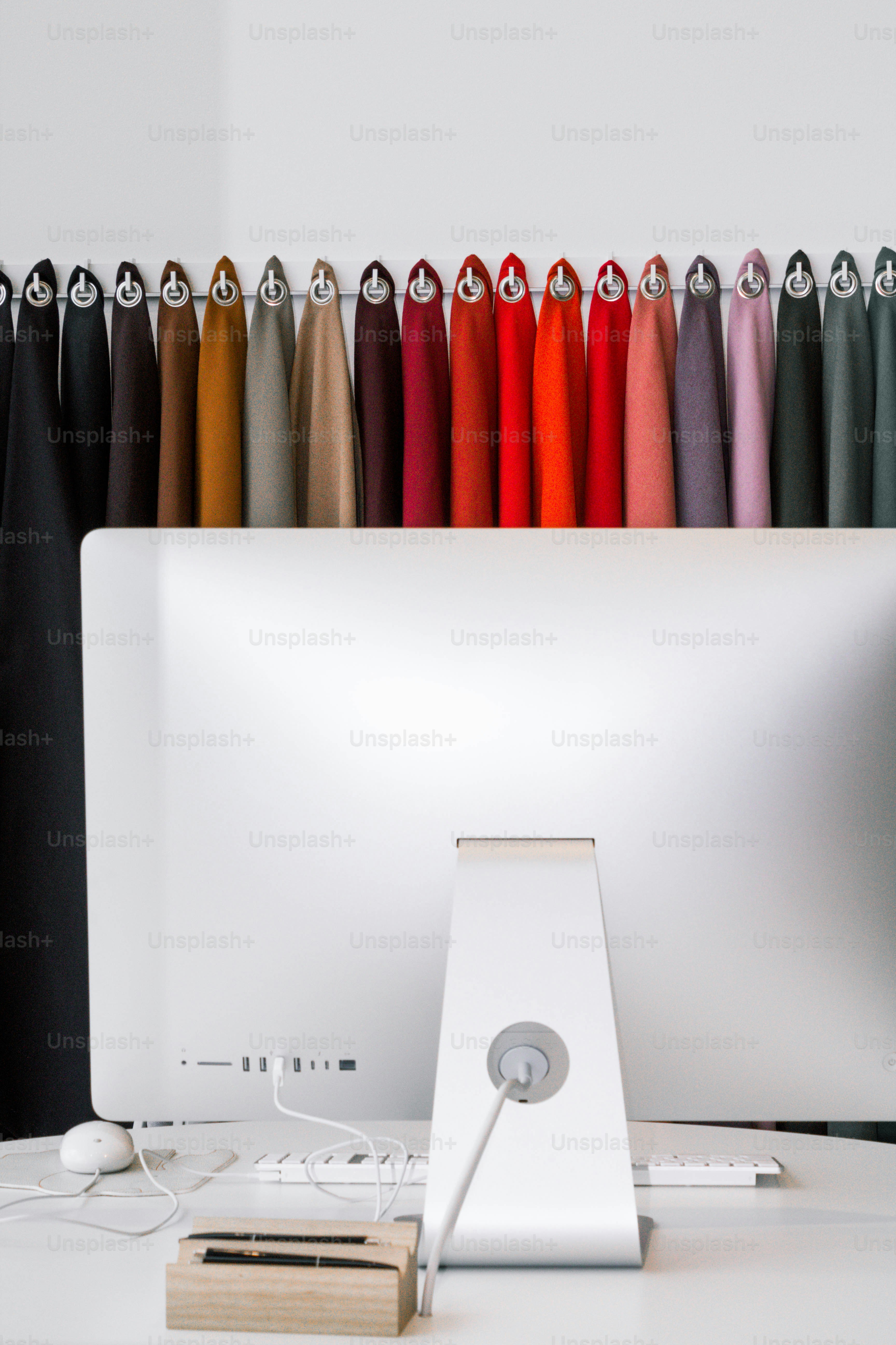 a desktop computer sitting on top of a white desk