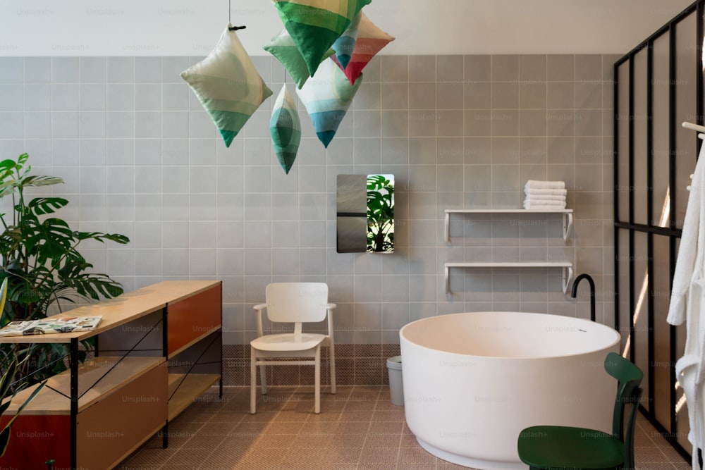 a bath room with a bath tub a chair and a mirror