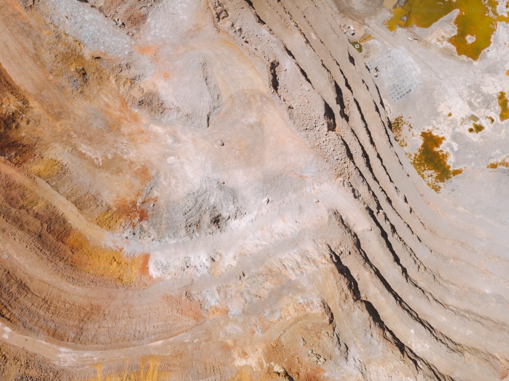 an aerial view of a dirt and rock area
