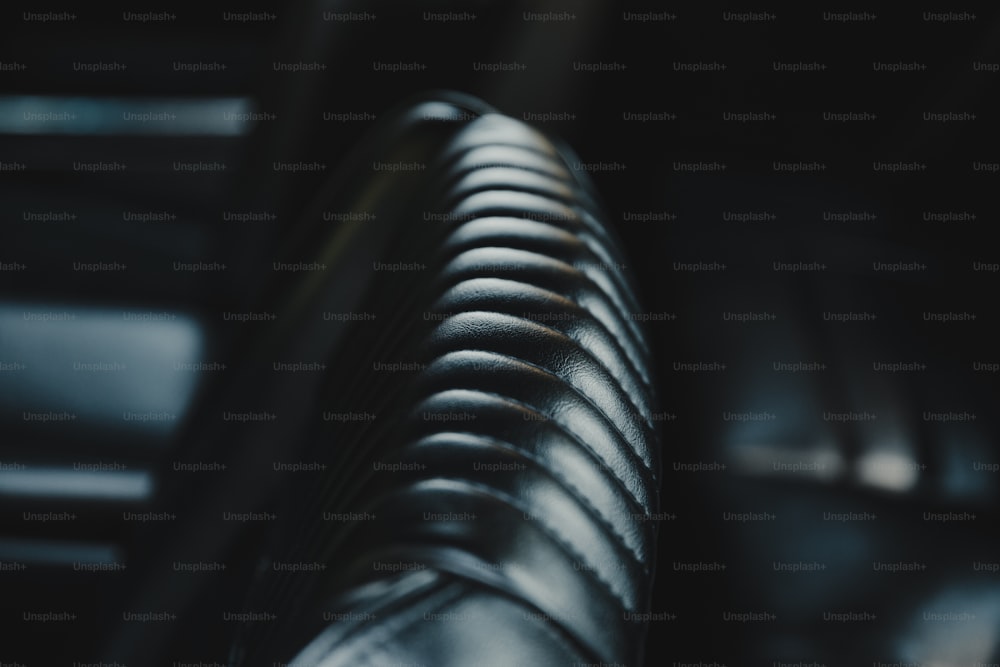 a close up of a leather seat in a car