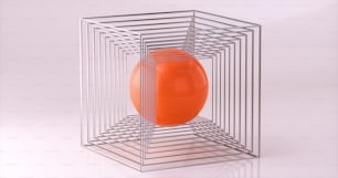 an orange vase sitting inside of a metal cage