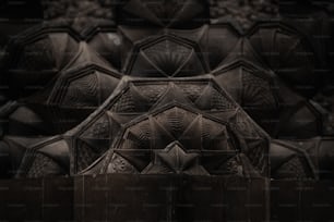 a black and white photo of a wall made out of many different shapes and sizes