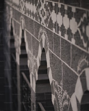a black and white photo of a wall