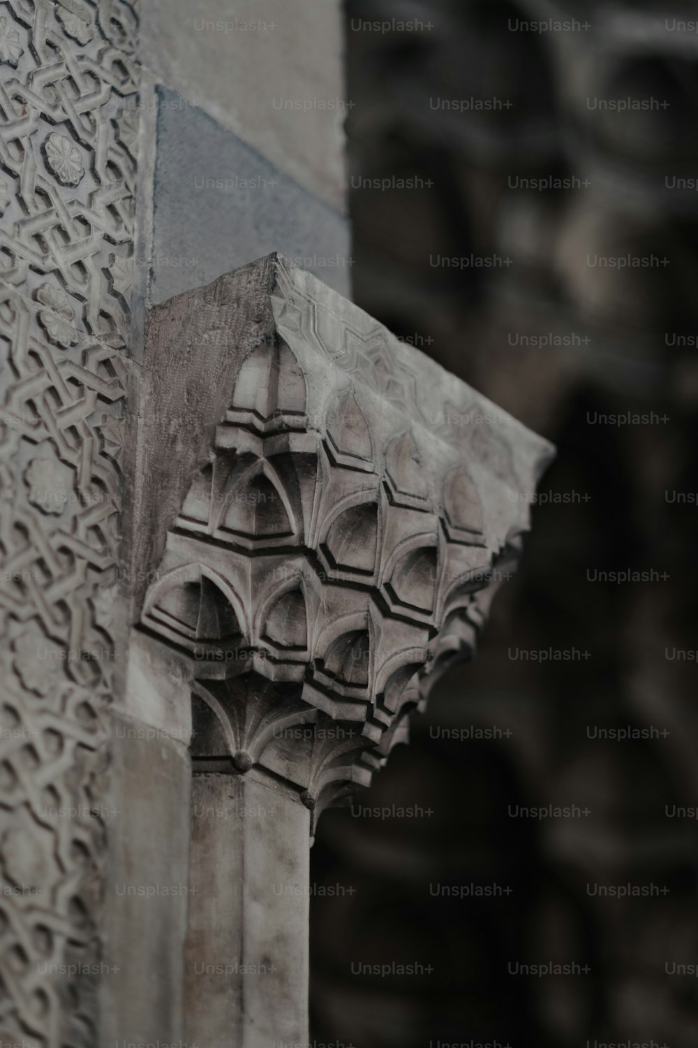 the corner of a building with a decorative design on it