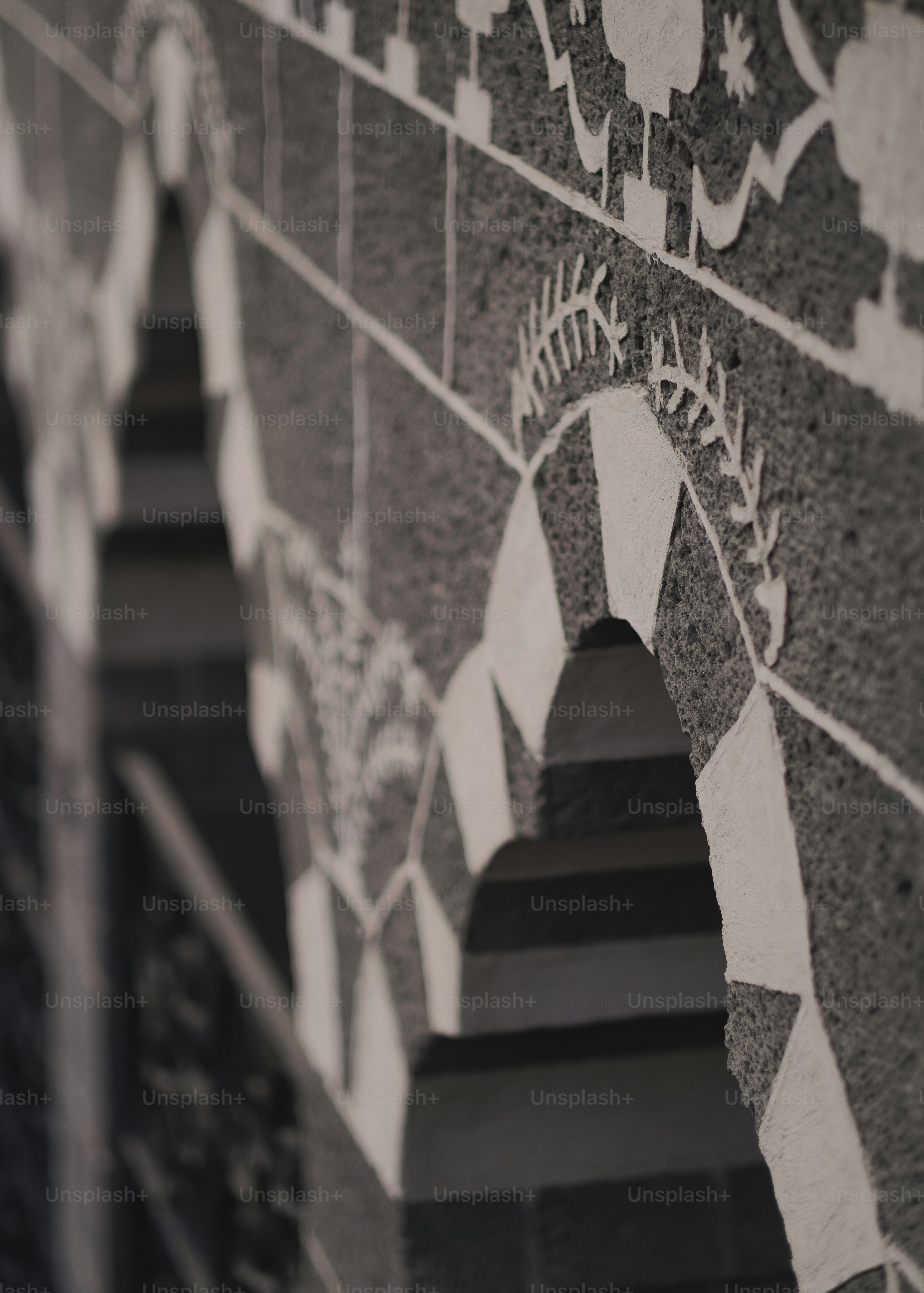 a black and white photo of a wall