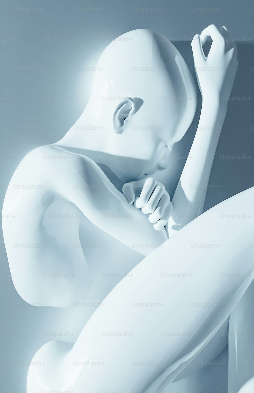 a white sculpture sitting on top of a white table