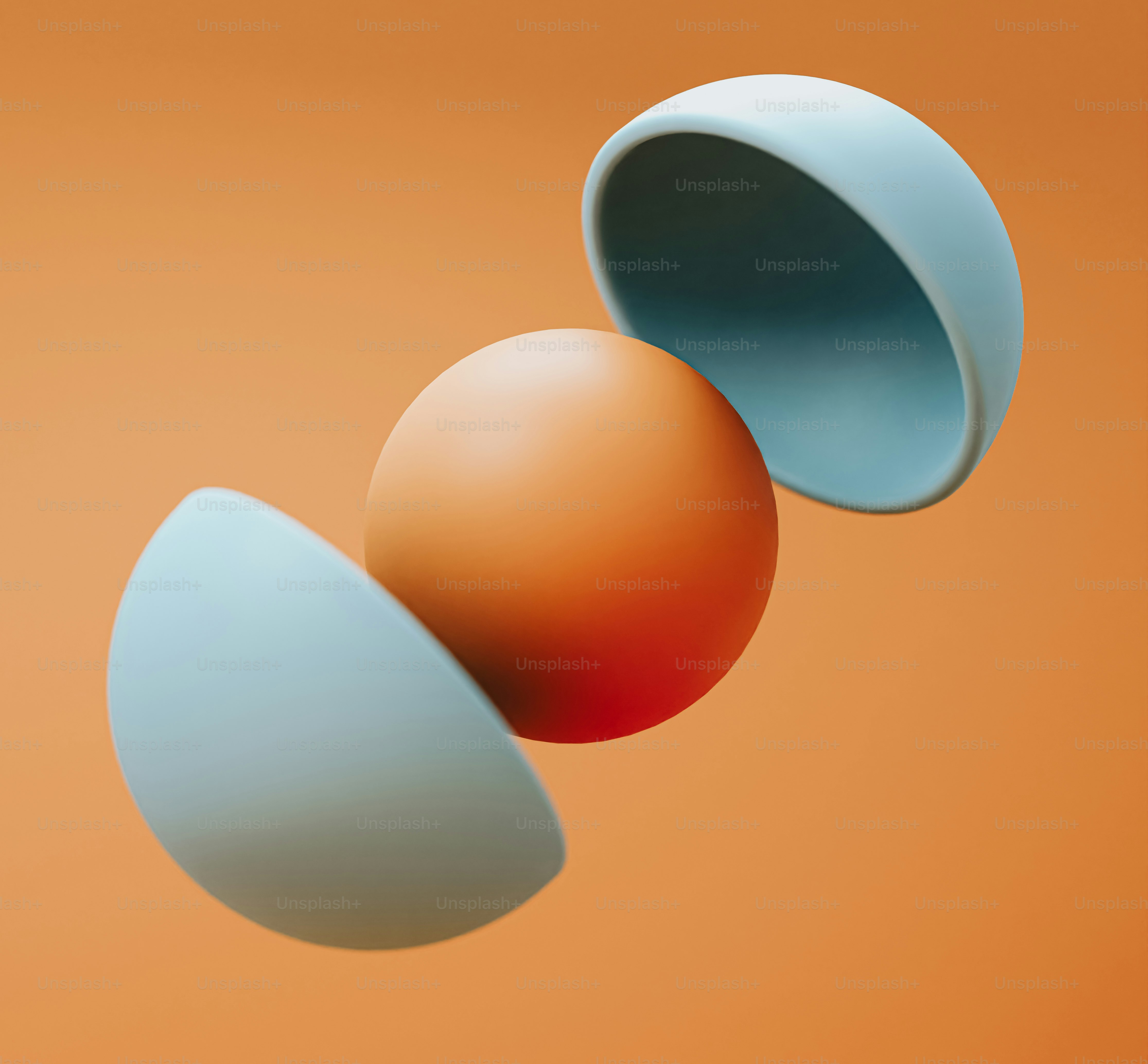 três ovos laranja e azul estão seguidos