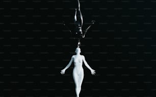 a woman is suspended upside down in the air