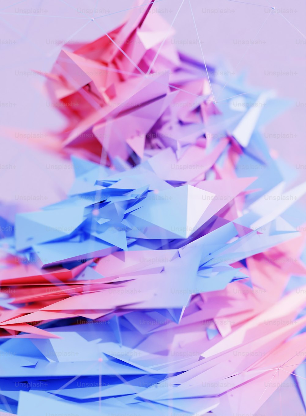 a bunch of pink and blue paper cranes