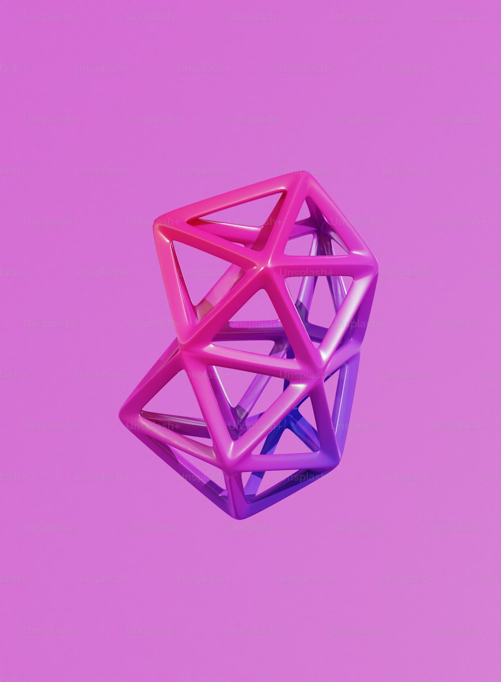 a pink and purple object floating in the air