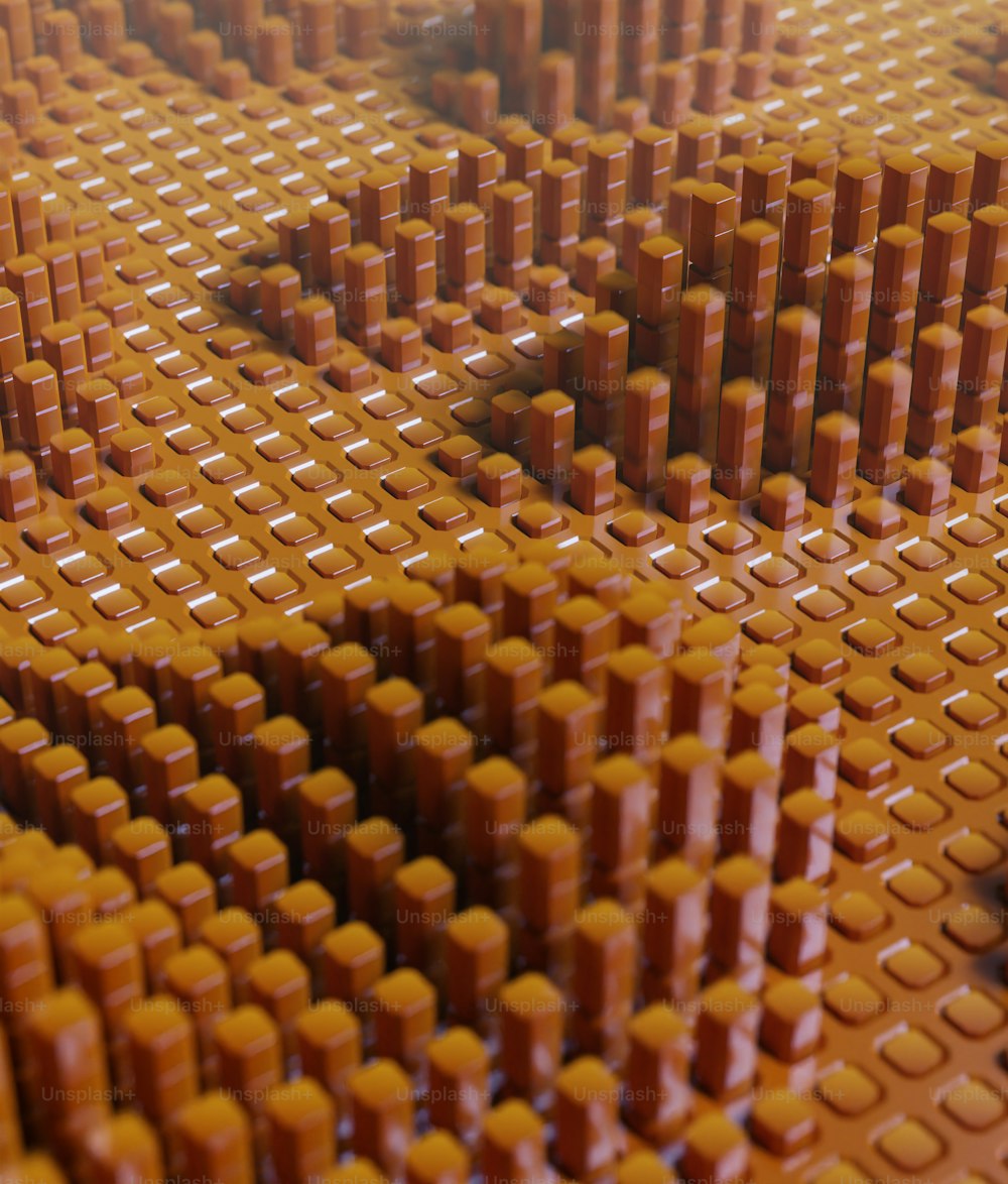 Um close up de uma estrutura de Lego feita de tijolos laranjas
