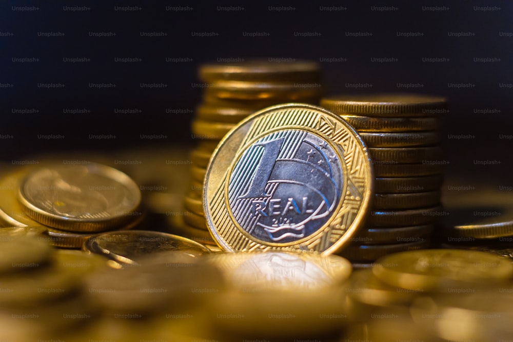 a close up of a pile of coins