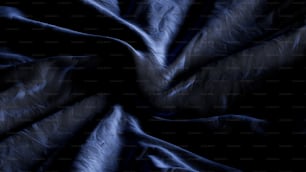 ein schwarzer Hintergrund mit einer blauen Stoffstruktur