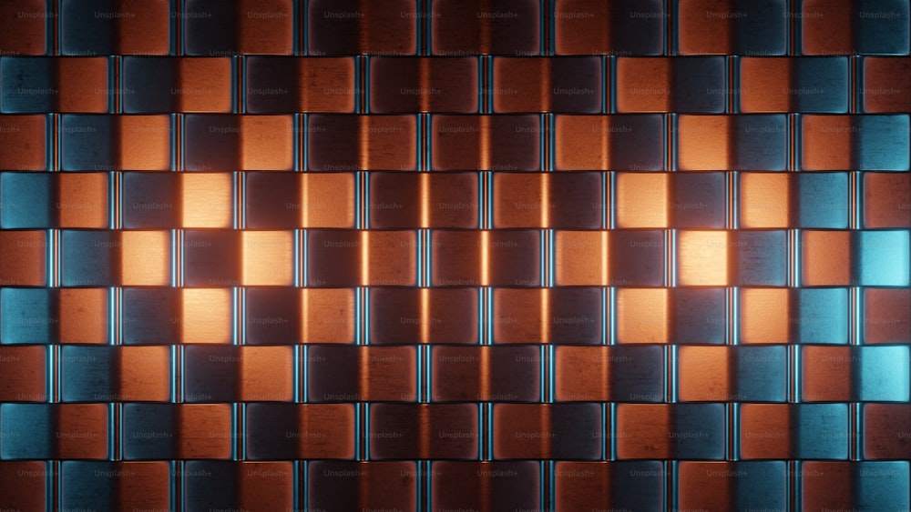 Un primo piano di una parete piastrellata con quadrati arancioni e blu