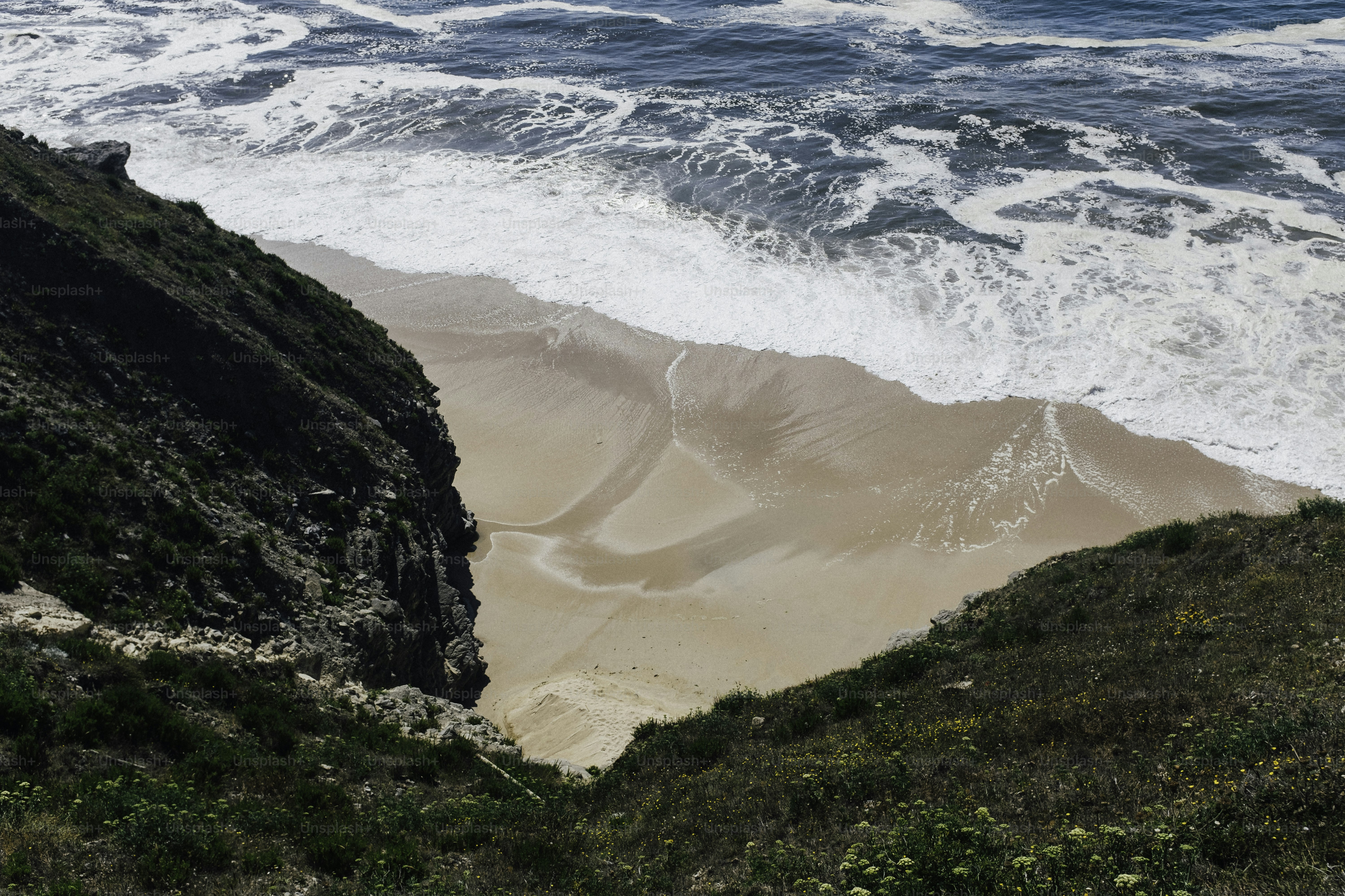 a view of the ocean from a cliff