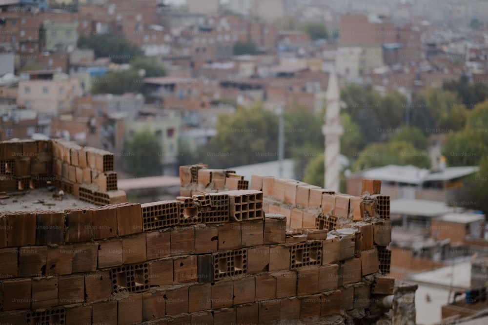 a pile of bricks sitting on top of a building