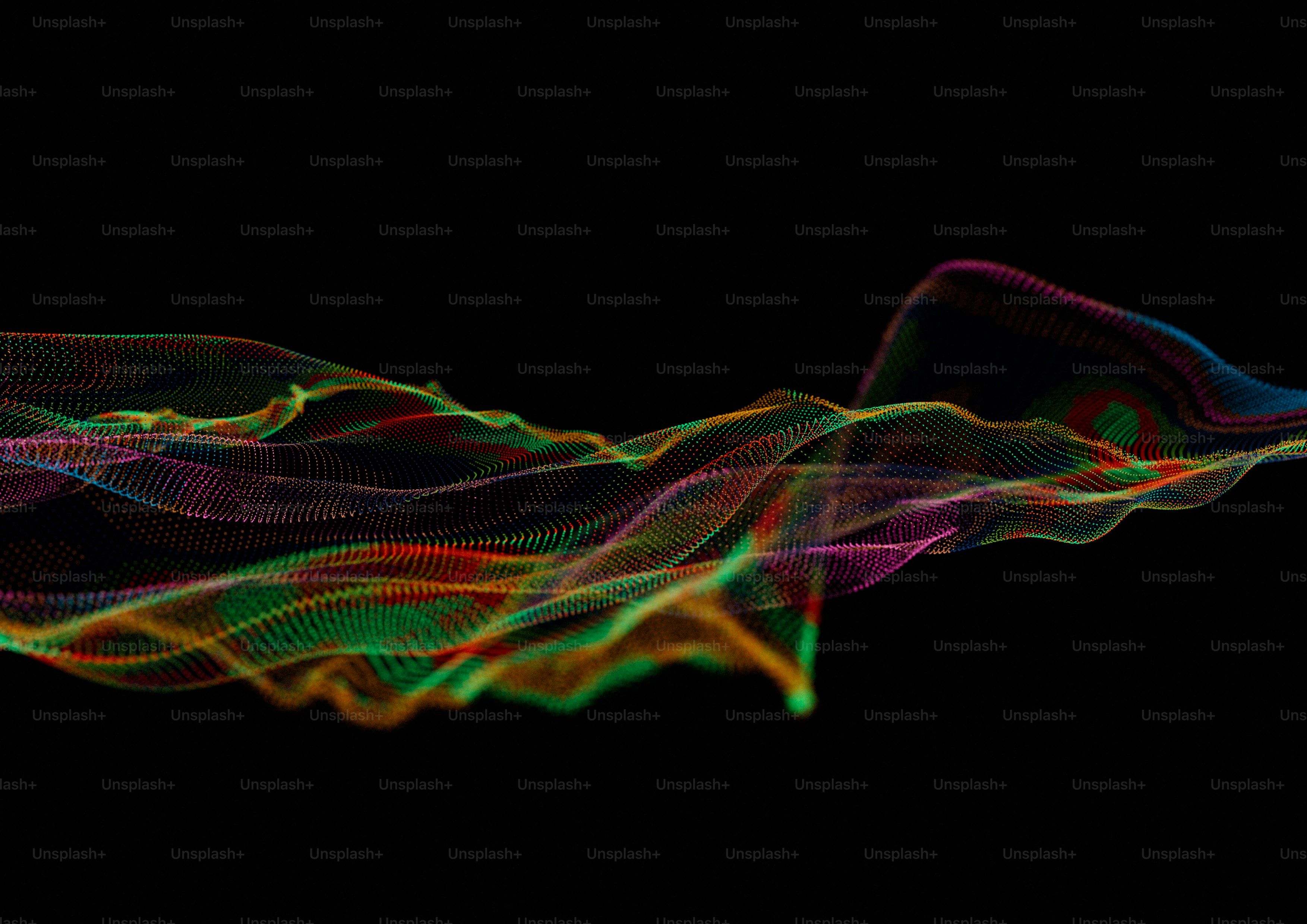 a blurry photo of a wave of light on a black background