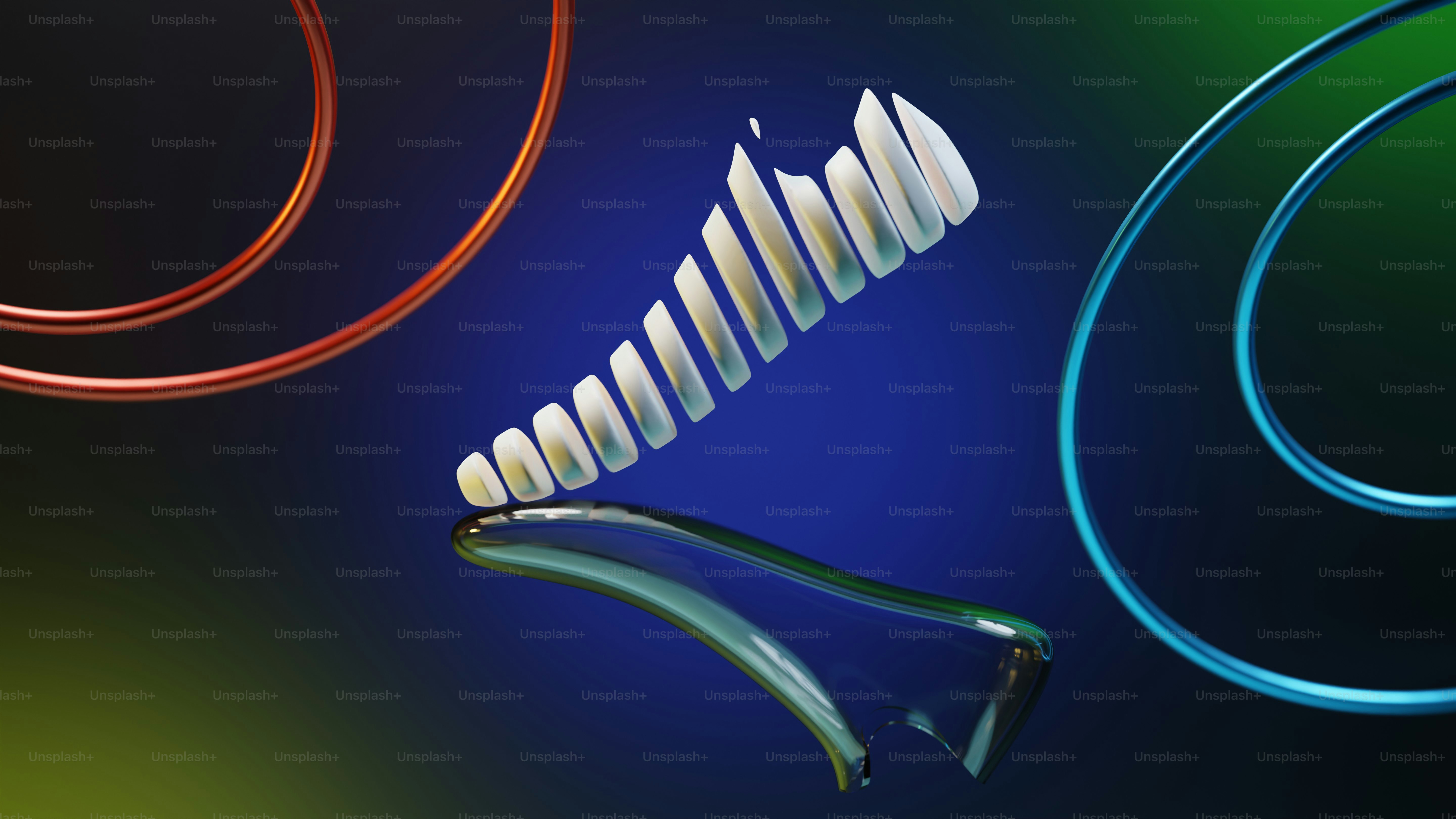 A group of different colored objects on a blue background photo ...