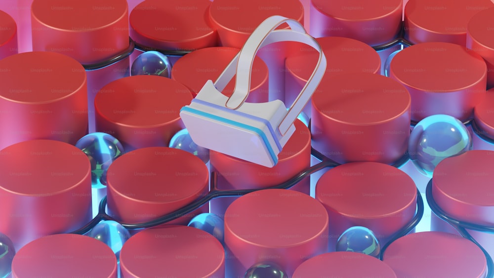a bag sitting on top of a pile of red cylinders