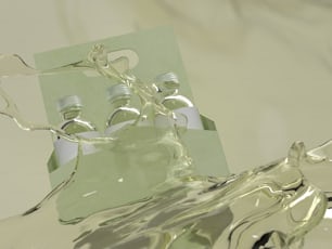 a couple of bottles of water sitting on top of a table