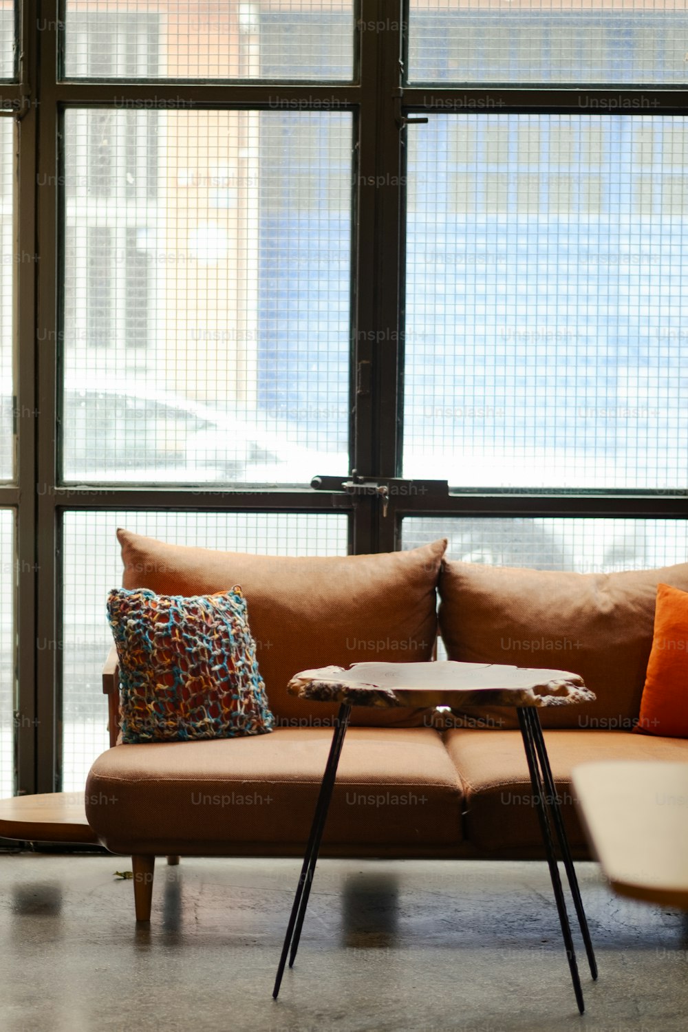 a living room with a couch and a coffee table