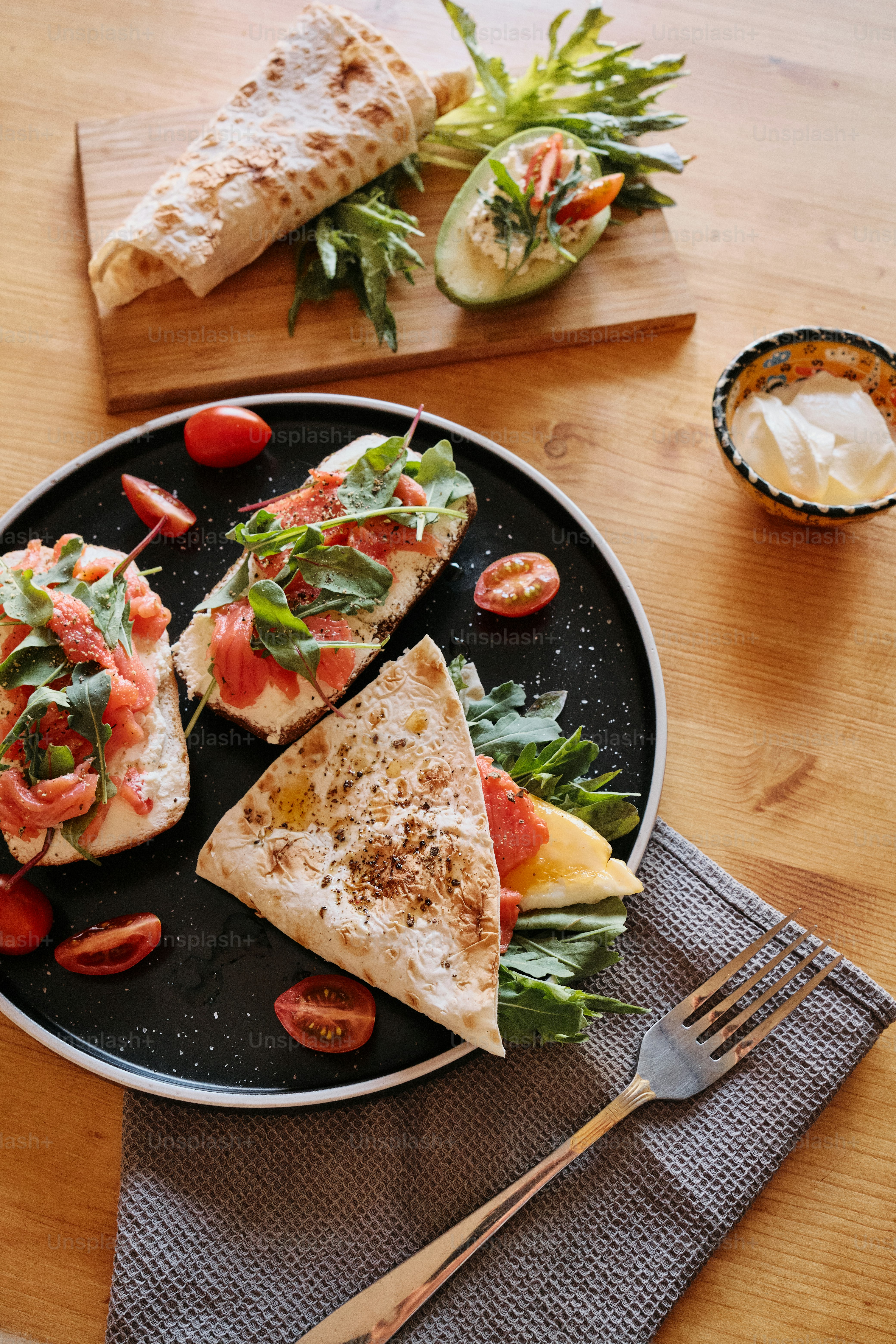 a plate of food on a wooden table