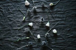 a bunch of flowers that are laying on a table