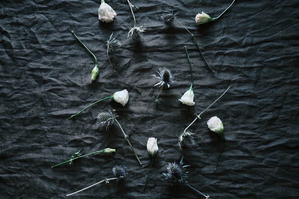 a bunch of flowers that are laying on a table