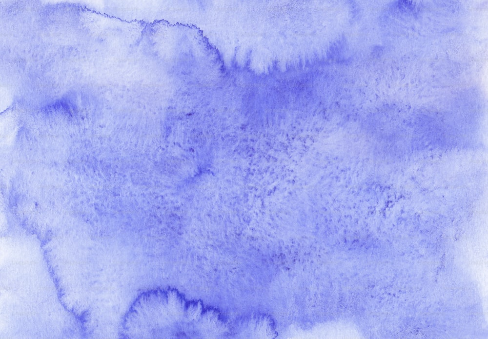 un fondo azul y blanco con una textura rugosa