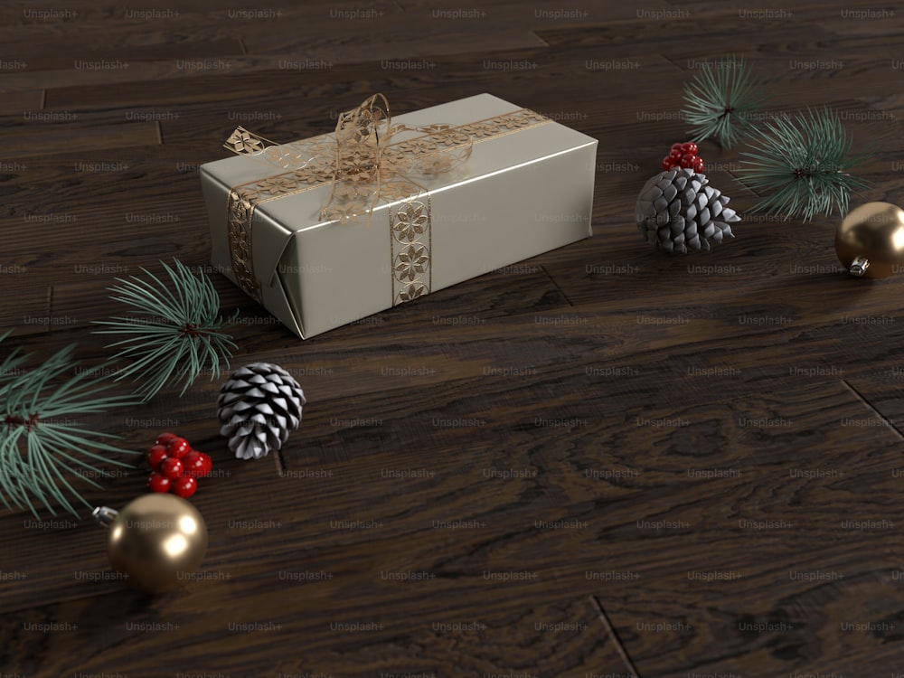 uma caixa de presente sentada em cima de um piso de madeira