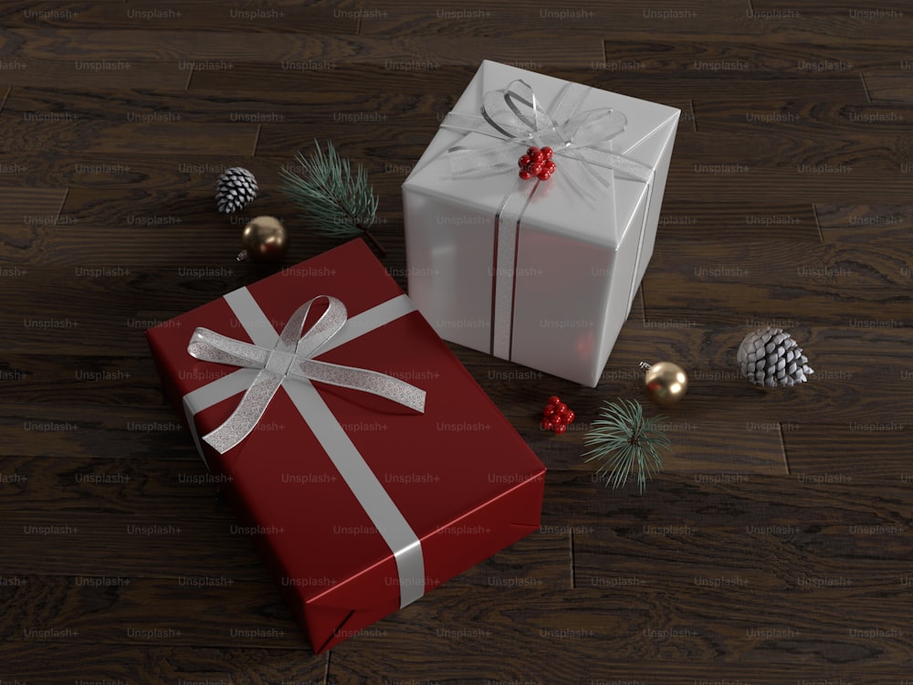 Una caja de regalo roja con una cinta blanca y un lazo blanco