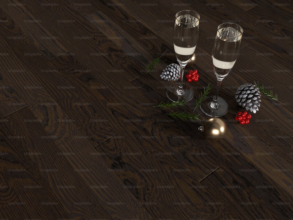 una mesa de madera cubierta con dos copas de vino