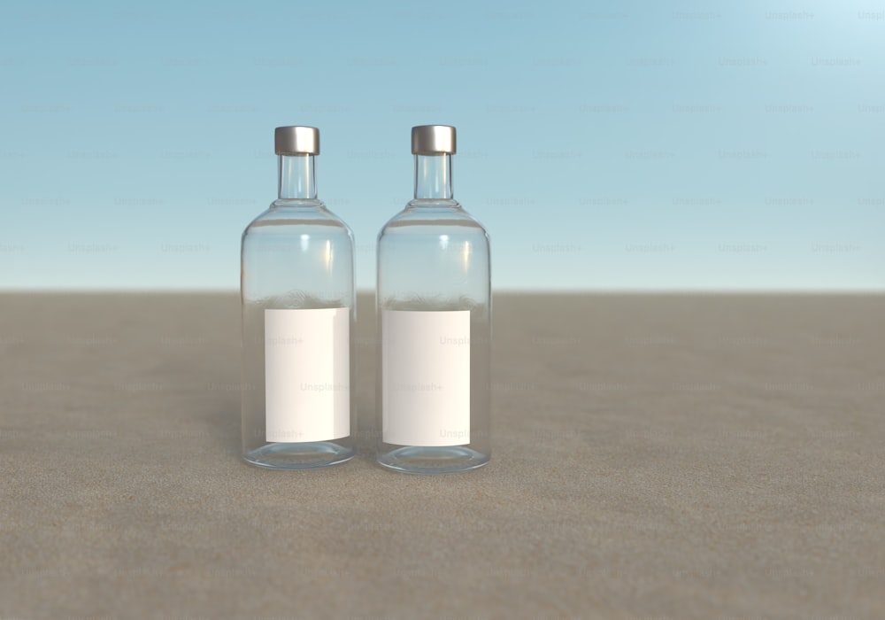 two empty bottles sitting next to each other