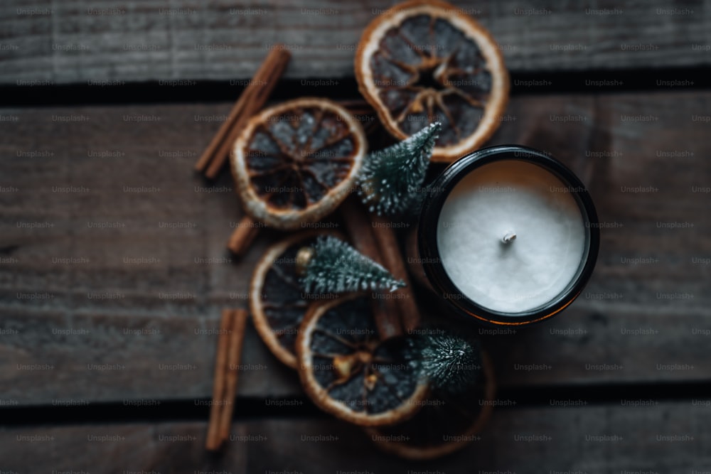 a candle sitting on top of a wooden table